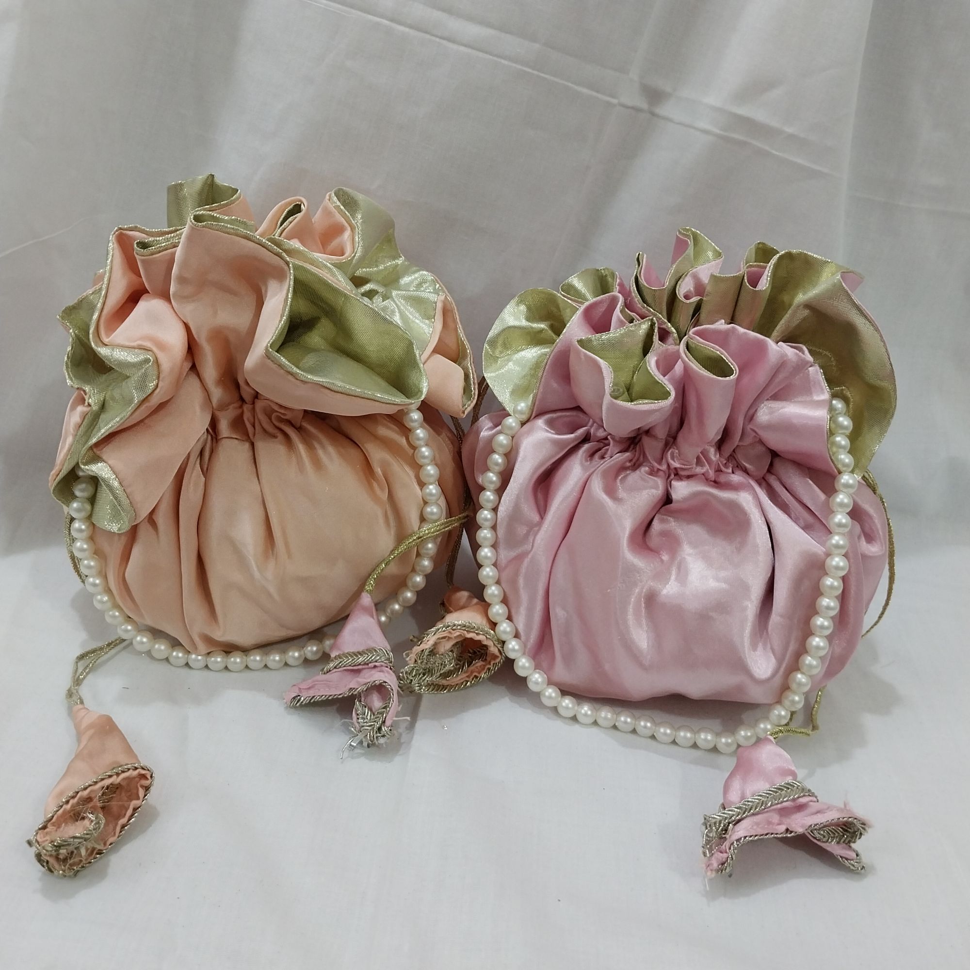 Ruffle Hand potli clutch bag for wedding with pearl handle