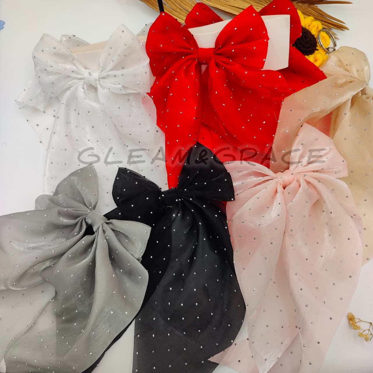 1 Pc Fashion Flair Big Satin Hair Bow made up of organza, and is embellished with small, sparkling stones .for Women & Girls – Oversized Bow Clip, Soft Silky Finish, Elegant Ribbon Hair Accessory (Random colors) by Gleam&Grace