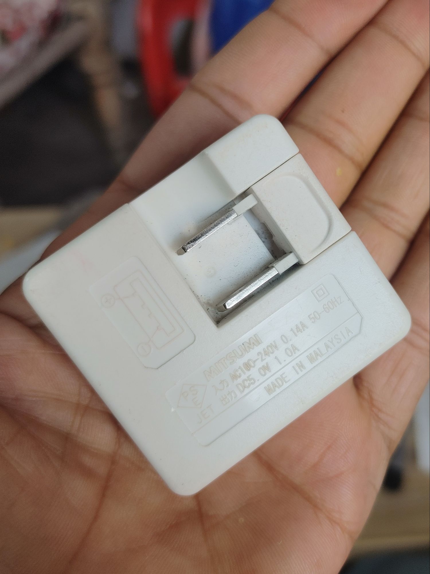 Mini small wall charger for keypad mobiles, smart watches, LED bulb, bluetooth headset, wireless headphones, neckbands, ear buds etc. 5V/1A charging capability. Small and smart wall charger