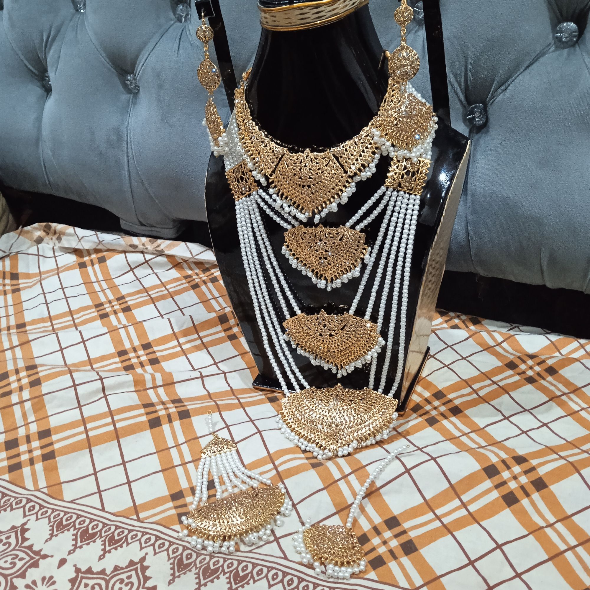 Bridal Jewellery set in Golden and White colour with beautiful White Pearl Mala, bindeya and jhumer