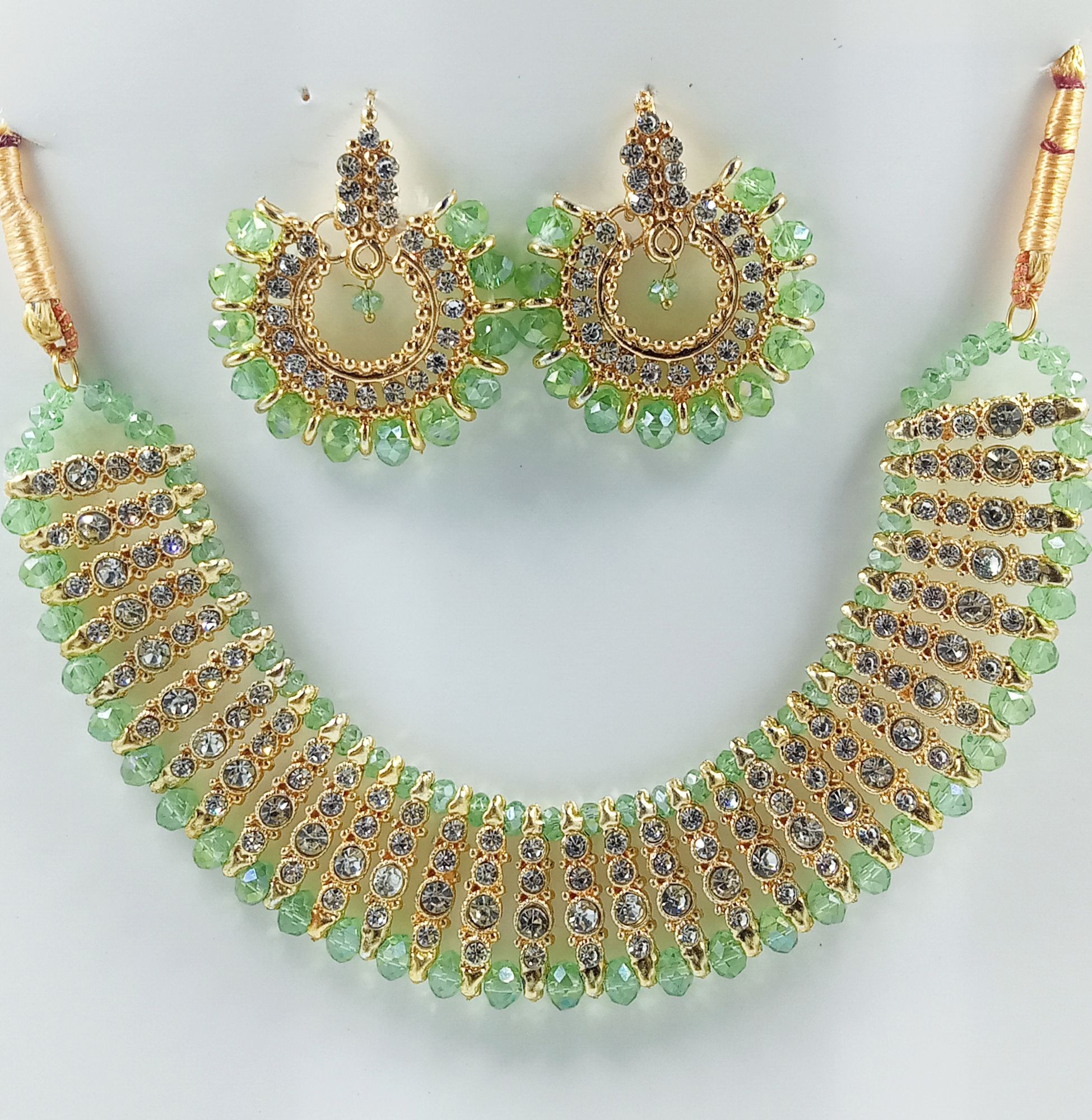 Black colour artificial jewellery set of round crystal earrings and chowker neckless high quality jewellery set in low price for women girls and bridals for weddings and Eid party low weight and heavy look
