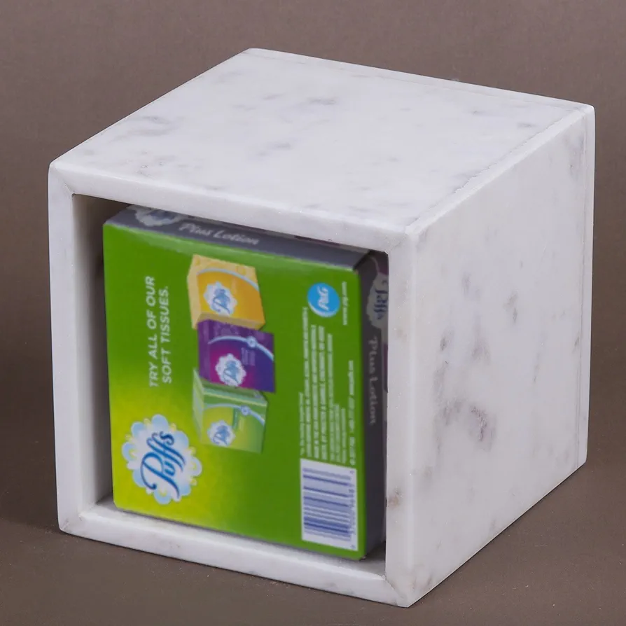 A sleek white square tissue box with a marble-like pattern, offering a clean and modern design. Its smooth finish complements any room with a minimalist and elegant touch. 5