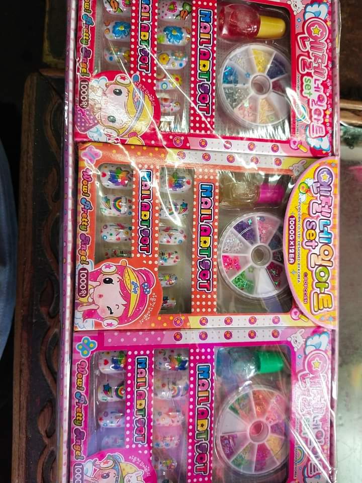 HOTTEST SALE New Generation Nail Art Kit With Glitter Nail Paint And Applier For Girls EACH ONLY IN RS (399)