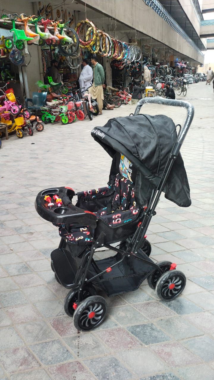 A High-Quality Foldable Baby Stroller with Fancy Pram, Double Handle, and Adjustable Buggy for the Modern Parent