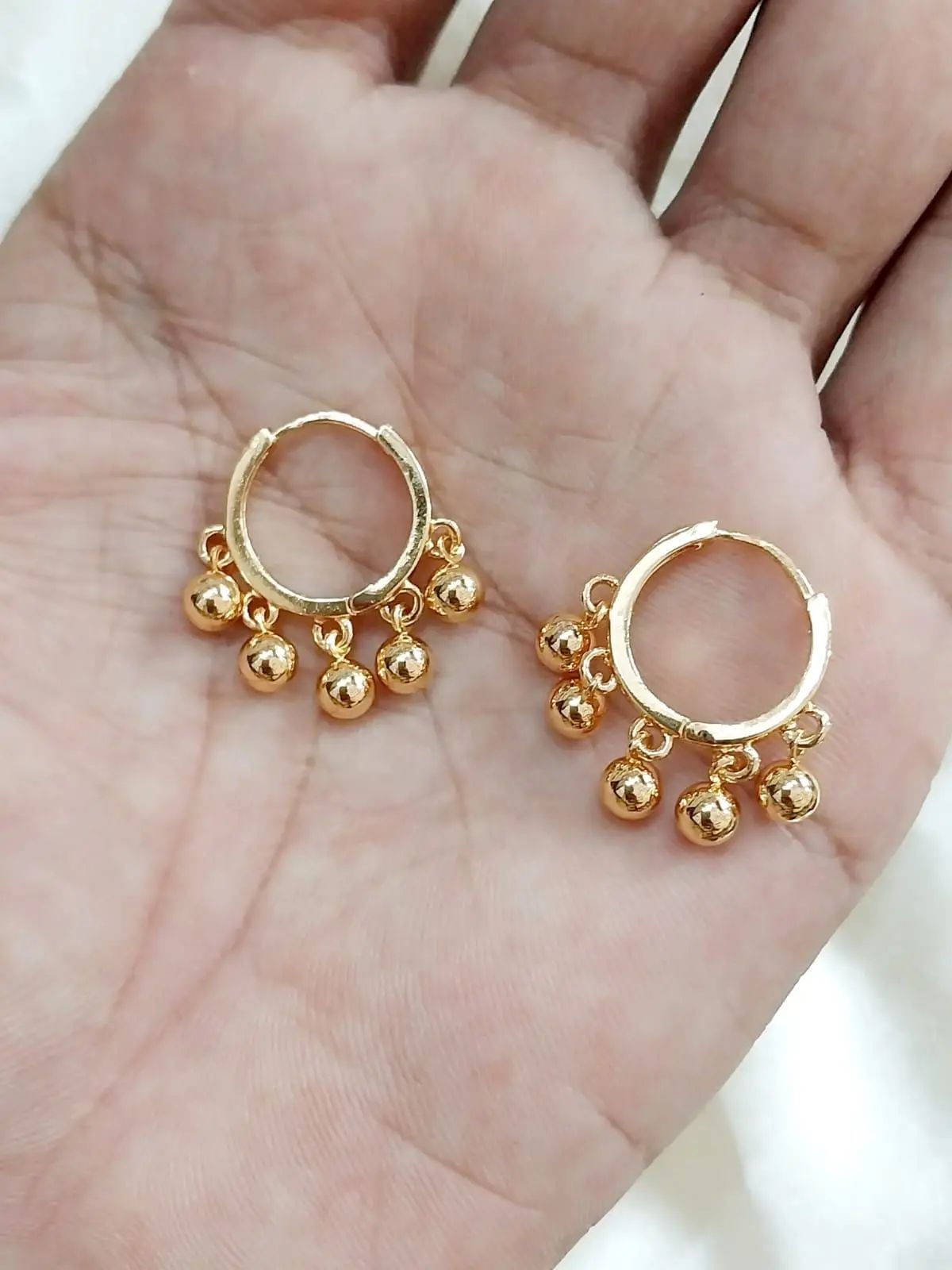 Unique Golden earrings for ladies
