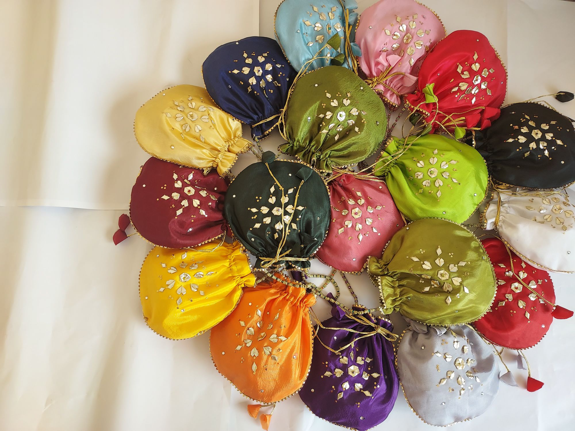Fancy embroidered clutch/potli bag for wedding parties designer traditional potli gol bag with Handmade Gota work