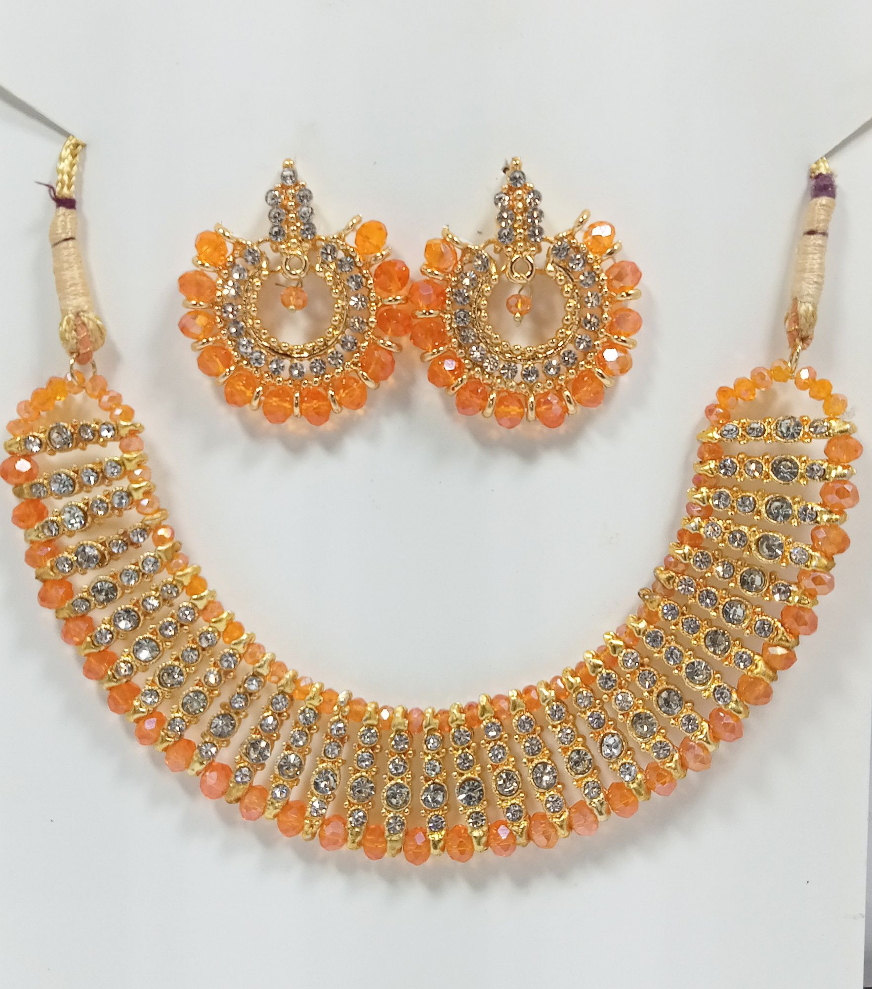 Black colour artificial jewellery set of round crystal earrings and chowker neckless high quality jewellery set in low price for women girls and bridals for weddings and Eid party low weight and heavy look
