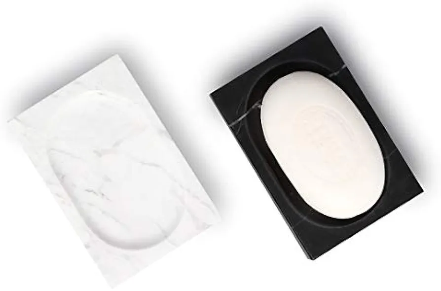 This sleek soap dish features a modern black and white color scheme, adding a touch of elegance to any bathroom. Its durable design ensures long-lasting use. 3