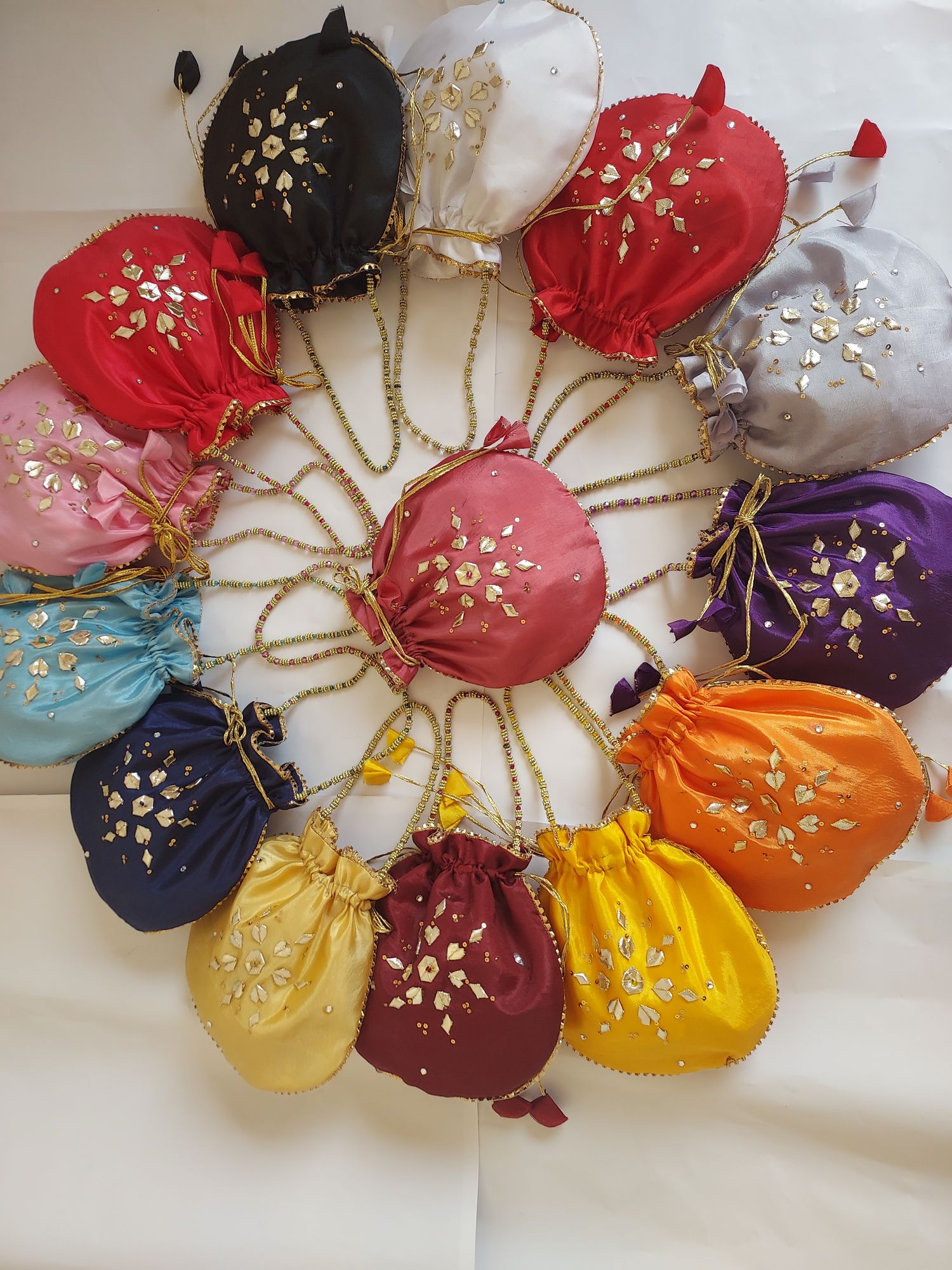 Fancy embroidered clutch/potli bag for wedding parties designer traditional potli gol bag with Handmade Gota work
