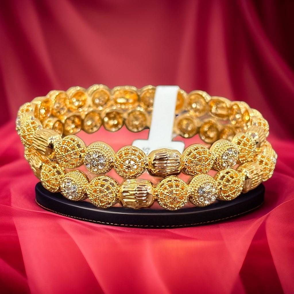 Gold covering deals bangles with price