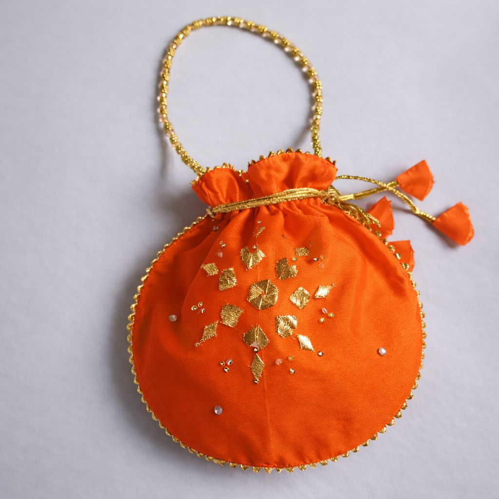 Fancy embroidered clutch/potli bag for wedding parties designer traditional potli gol bag with Handmade Gota work