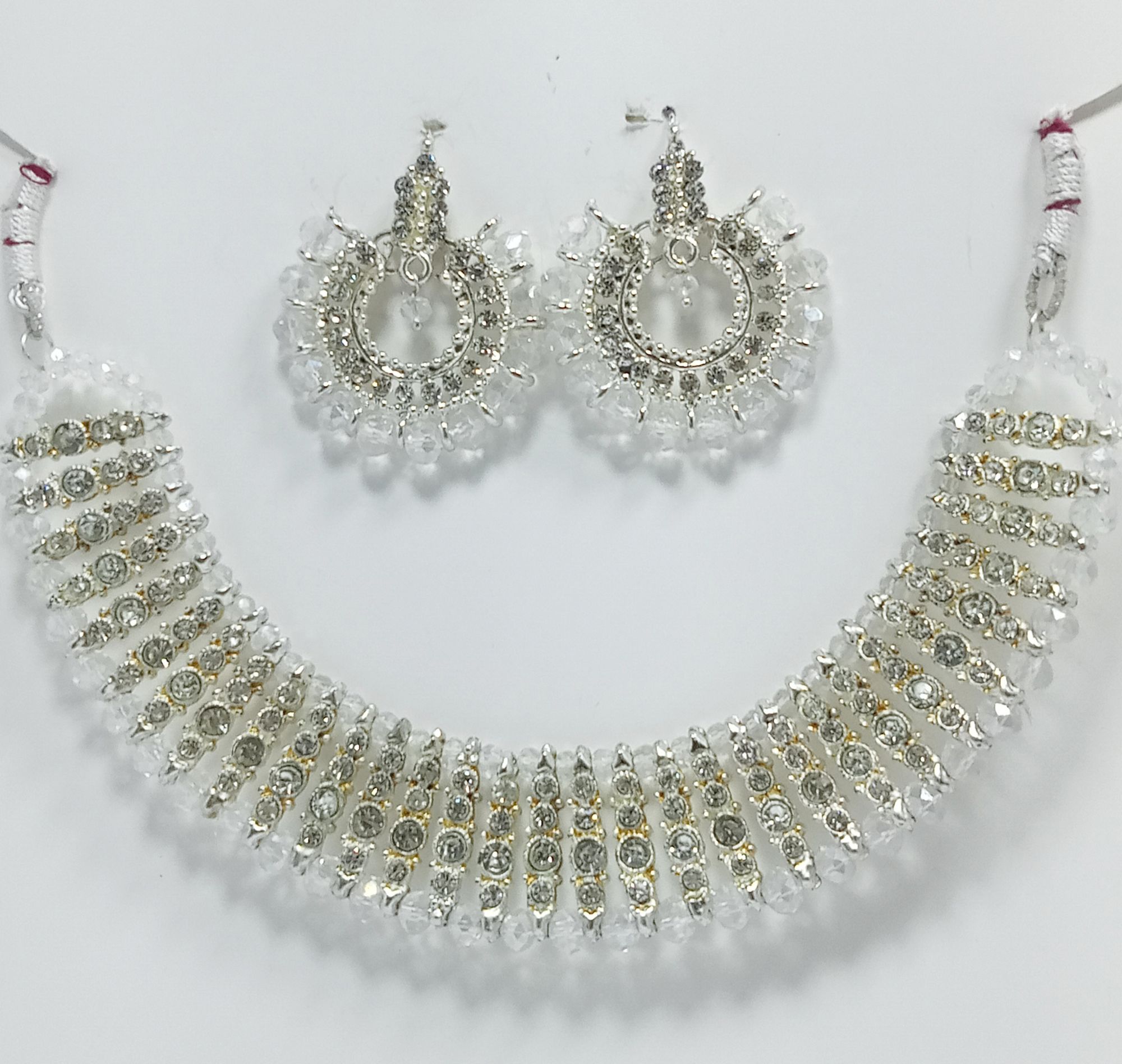 Black colour artificial jewellery set of round crystal earrings and chowker neckless high quality jewellery set in low price for women girls and bridals for weddings and Eid party low weight and heavy look