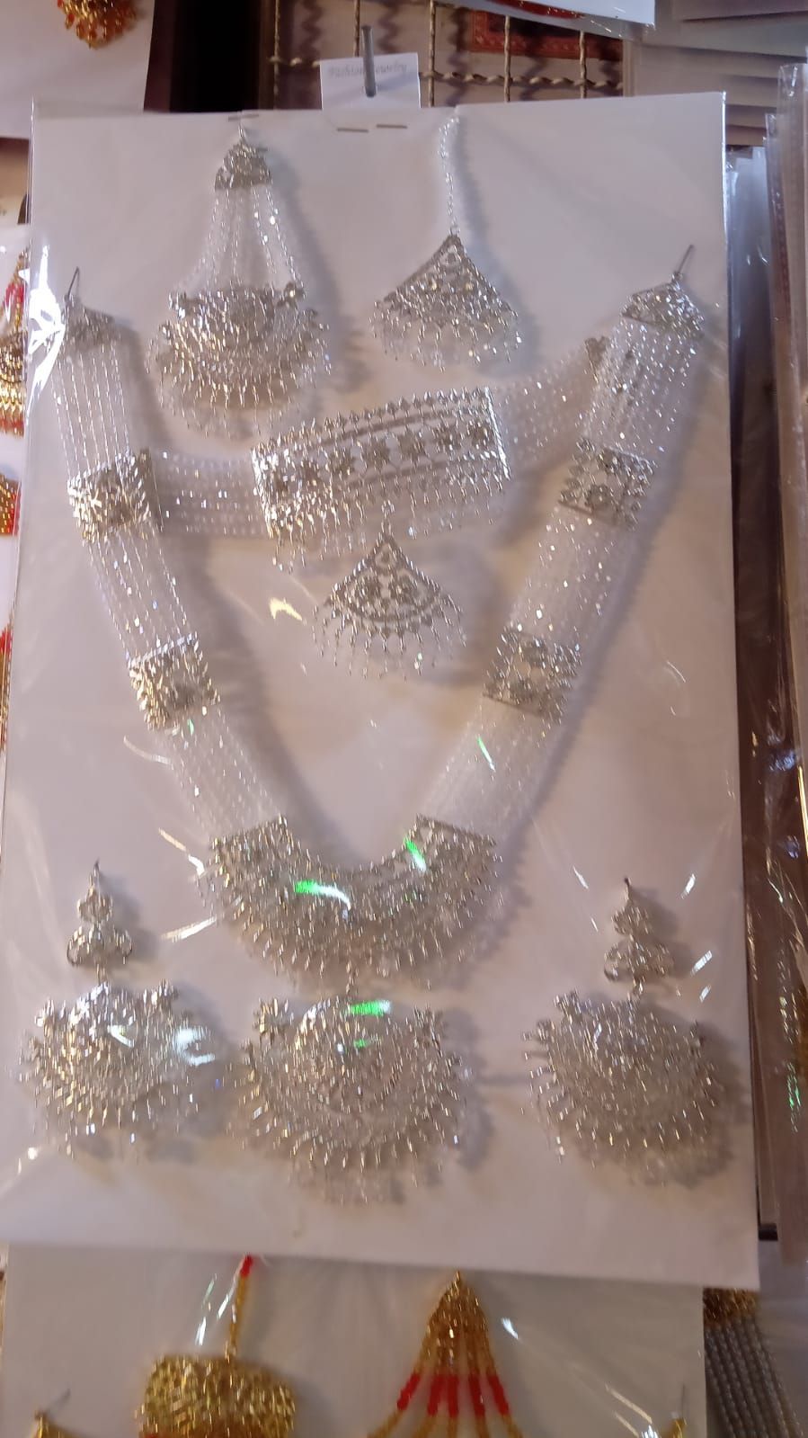 Bridal Jewellery set in Silver colour with beautiful Crystal Mala, bindeya and jhumer