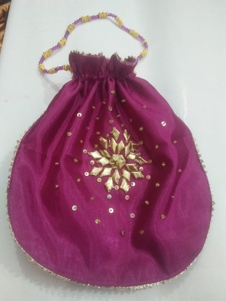 Fancy embroidered clutch/potli bag for wedding parties designer traditional potli gol bag with Handmade Gota work