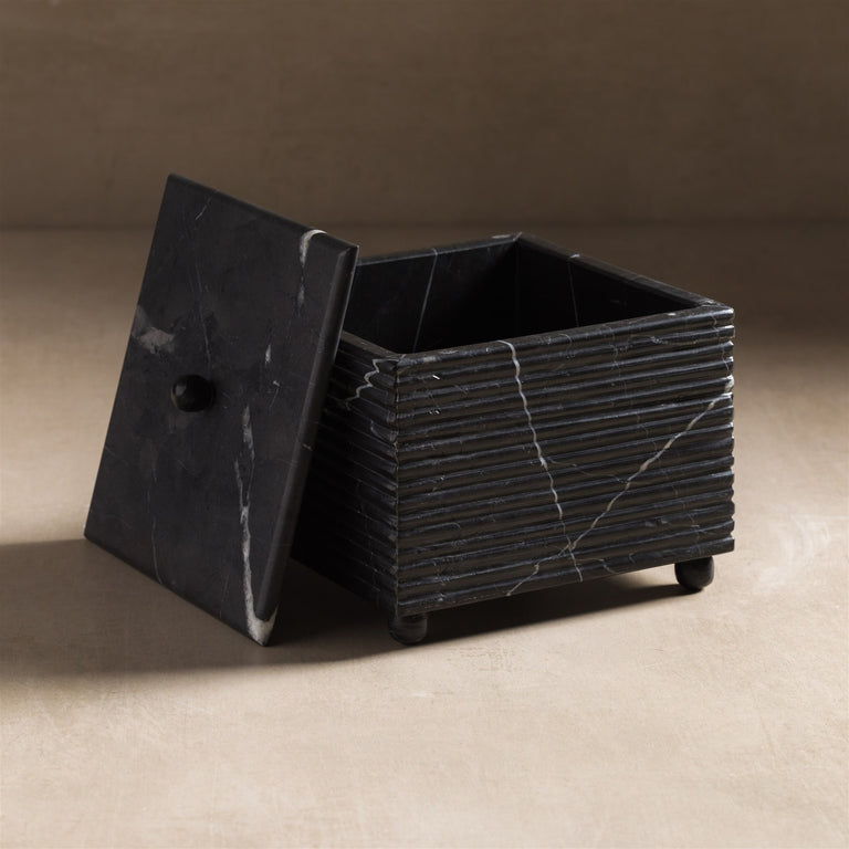 Sleek black jewelry box, designed for stylish storage and display of your cherished items. Simple elegance meets functionality. 2