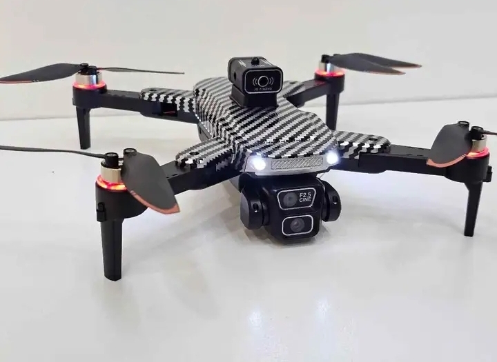 XF606 Triple Camera Brushless Motors Camera Drone With Rechargeable LCD Remote Also With 2.5 Cine Lens High Quality Obstacle Avoidance Camera Drone With Unique Packing Carbon Coting High Quality Body