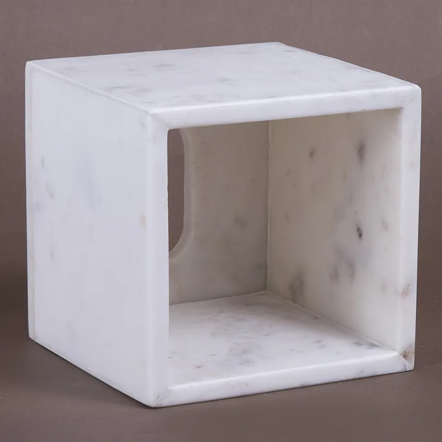 A sleek white square tissue box with a marble-like pattern, offering a clean and modern design. Its smooth finish complements any room with a minimalist and elegant touch. 4