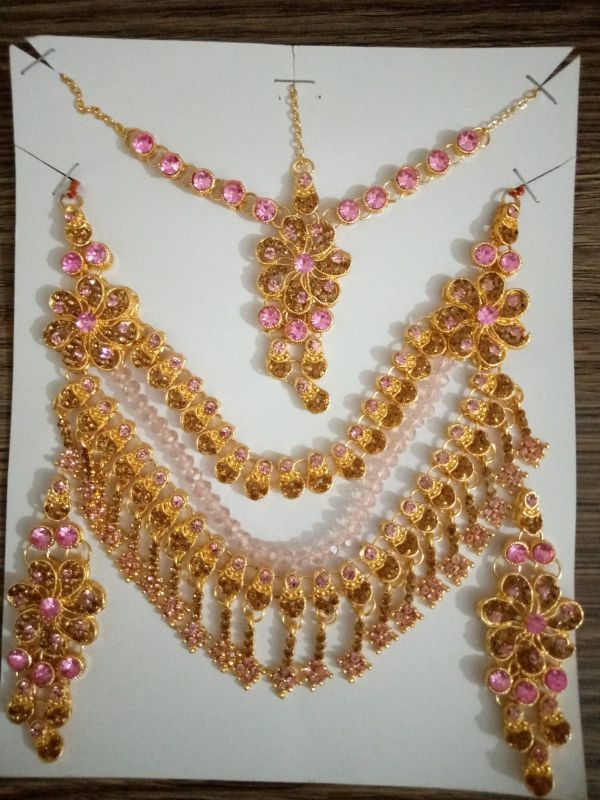 pink and golden jewellery