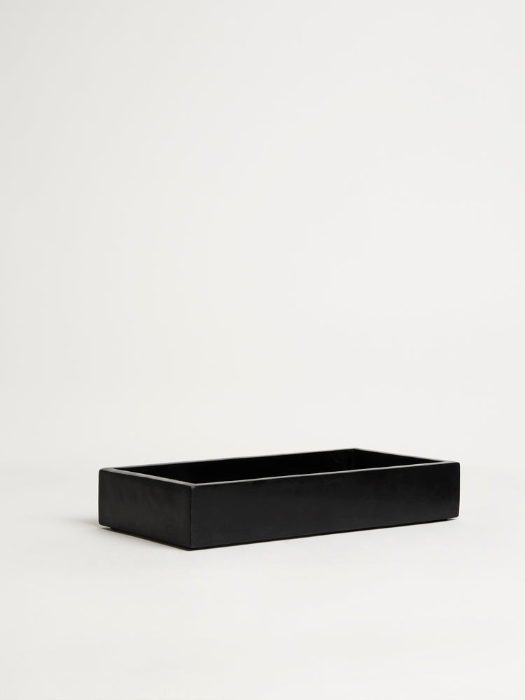 Full Black Marble Tray A sleek, polished black marble tray showcasing natural veining. 2