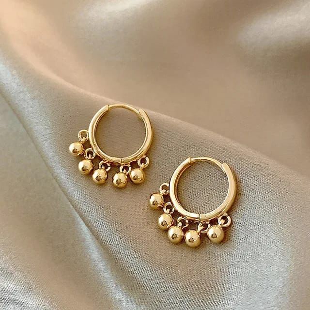 Unique Golden earrings for ladies