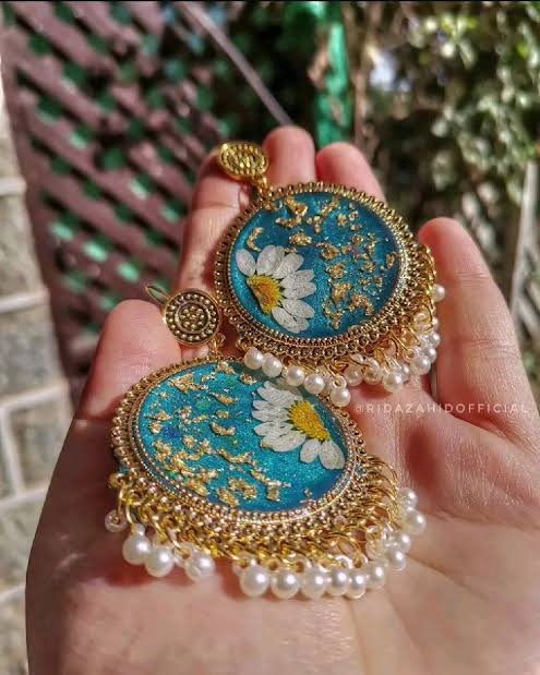 Customize Resin earing jhumka in dry flowers.