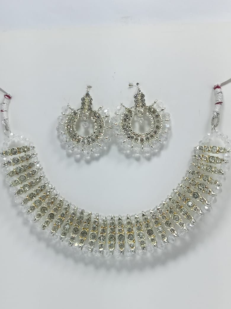 Black colour artificial jewellery set of round crystal earrings and chowker neckless high quality jewellery set in low price for women girls and bridals for weddings and Eid party low weight and heavy look