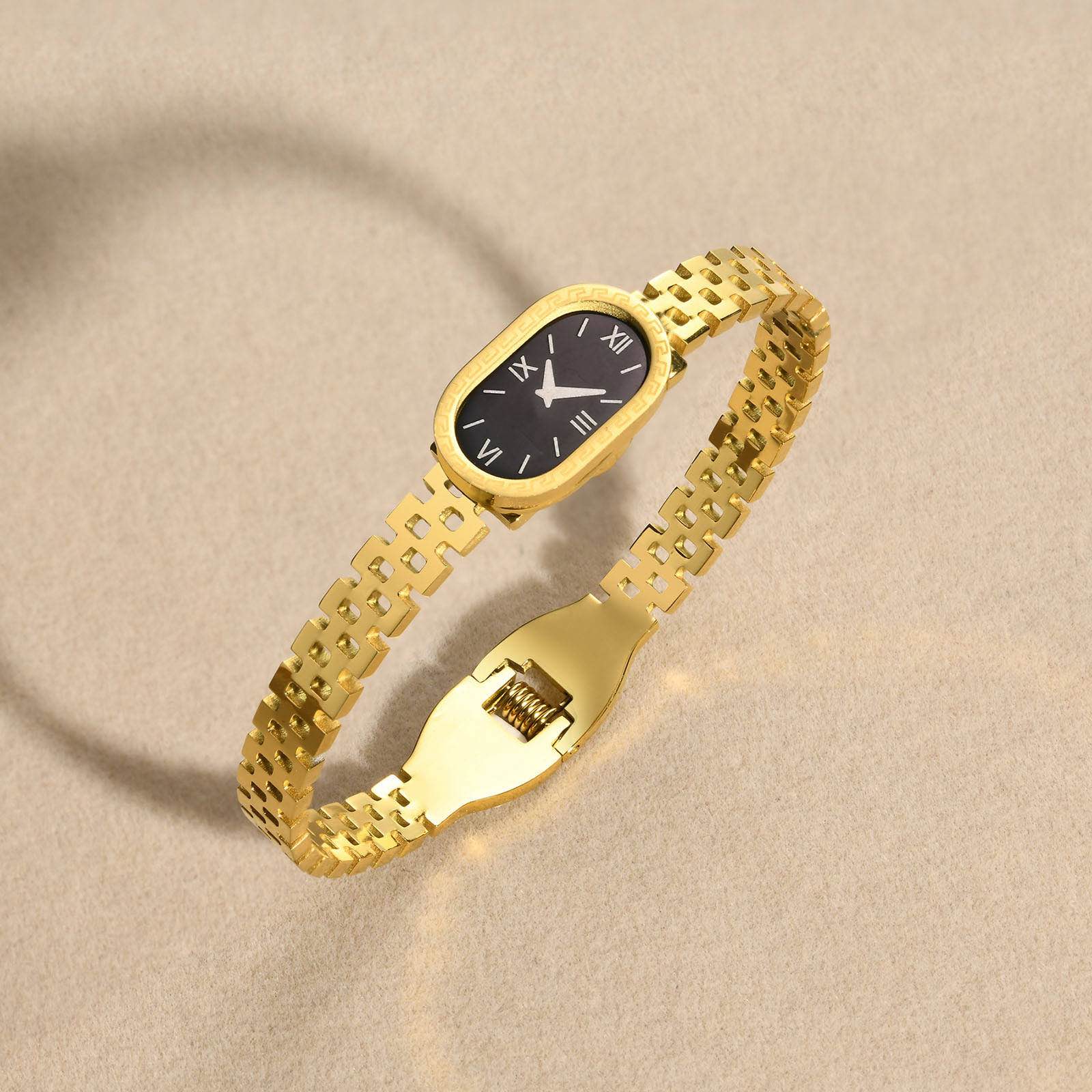 Elegant gold-tone bracelet artificial watch for girls – rectangular black dial with Roman numerals, rust-resistant stainless steel, perfect for festive glam or daily luxury