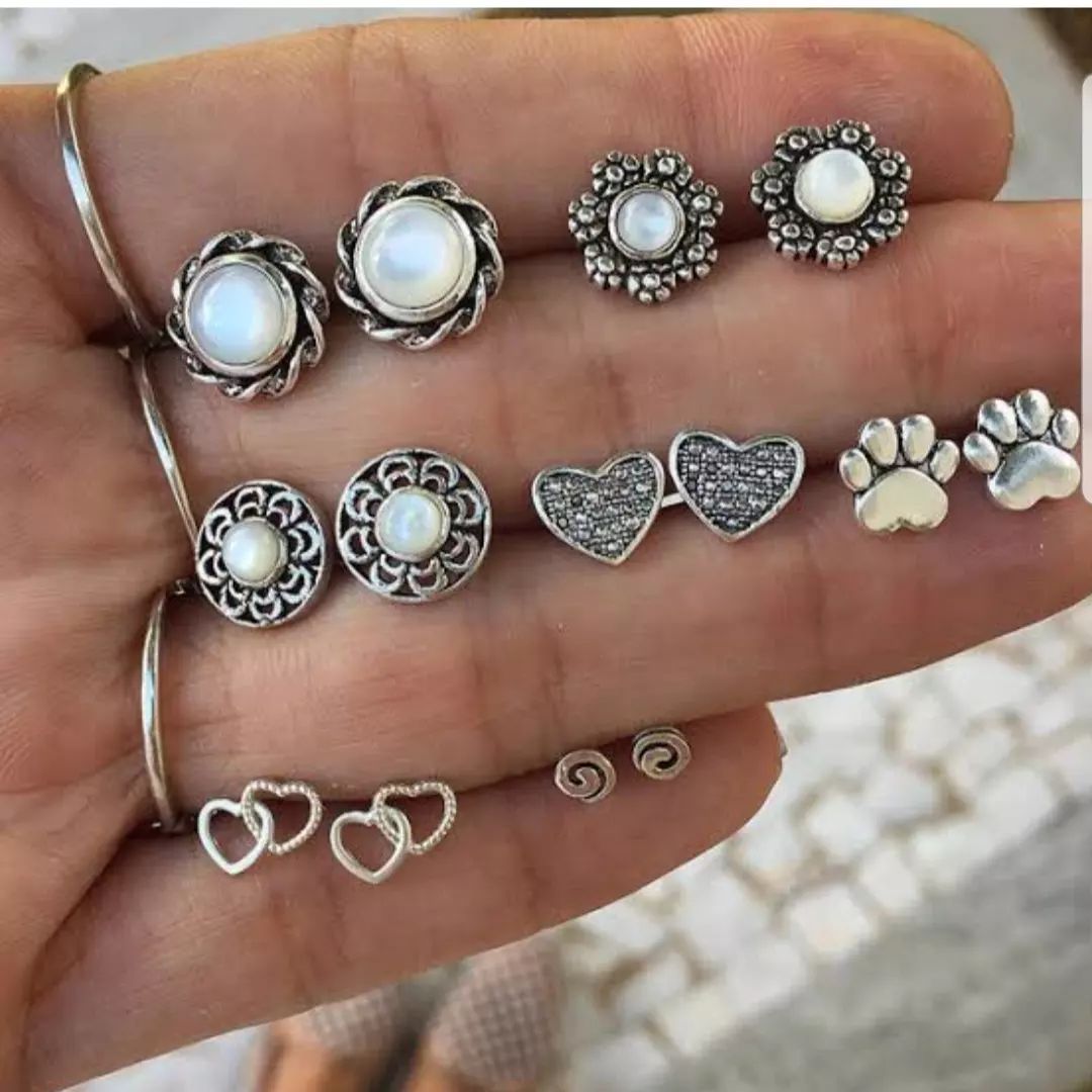 Silver Combo deal of 4 jewelry articles sun pendant ,ring chain bracelet, star earcuff set 1 sided and 7 pairs of earings. discounted deal combo deal