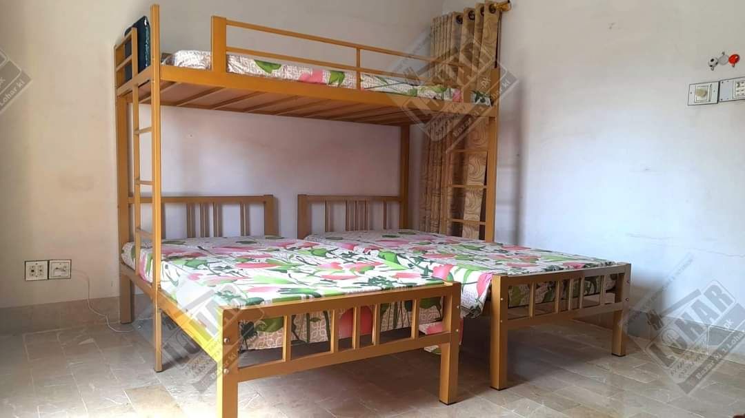 Metal Bunk Bed Frame over Two Single Wrought Iron Beds