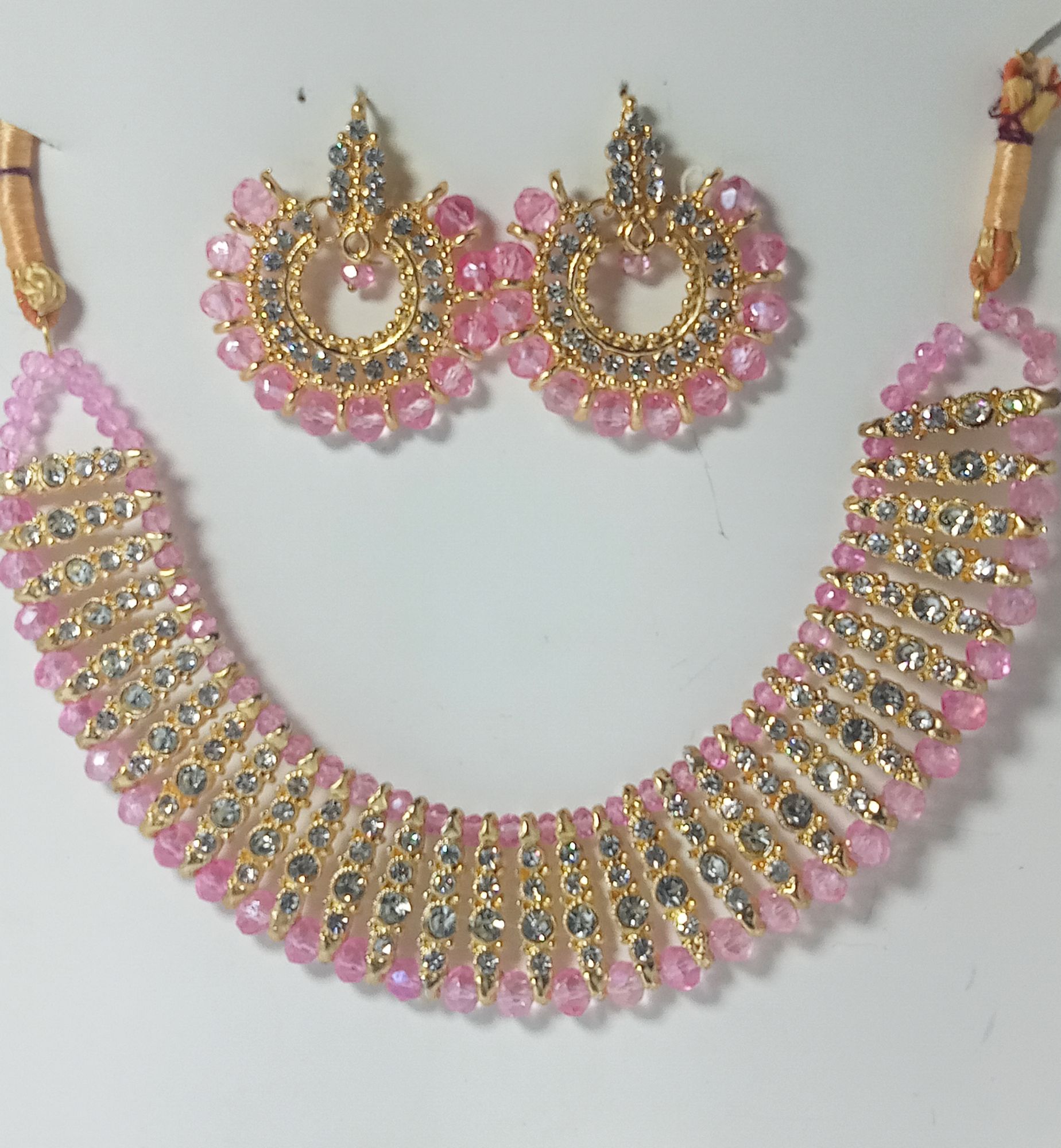 Black colour artificial jewellery set of round crystal earrings and chowker neckless high quality jewellery set in low price for women girls and bridals for weddings and Eid party low weight and heavy look