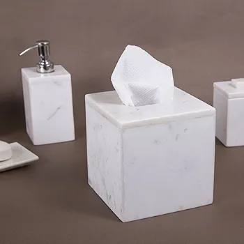 A sleek white square tissue box with a marble-like pattern, offering a clean and modern design. Its smooth finish complements any room with a minimalist and elegant touch. 6