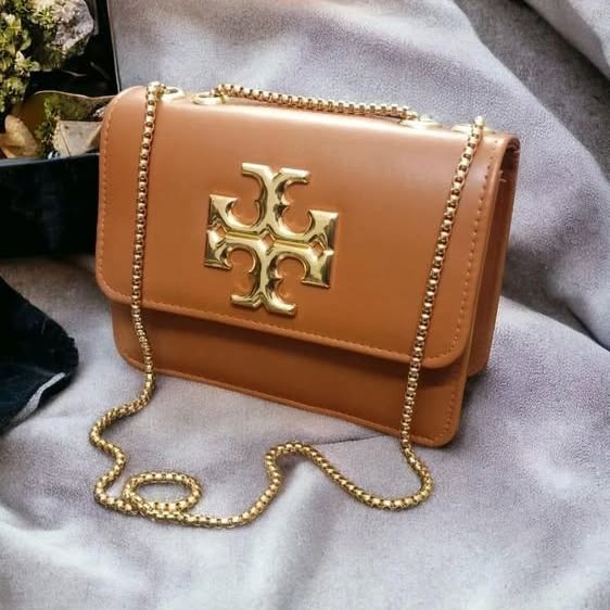 Tory Burch durable crossbody bag"
"Tory Burch lightweight crossbody bag"
"Tory Burch fashionable crossbody bag"
"Tory Burch trendy crossbody bag"Tory Burch Stylish Designer Crossbody Bag for Women - Luxury cross body bag for women