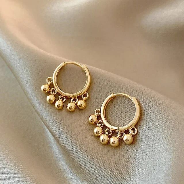 Unique Golden earrings for ladies