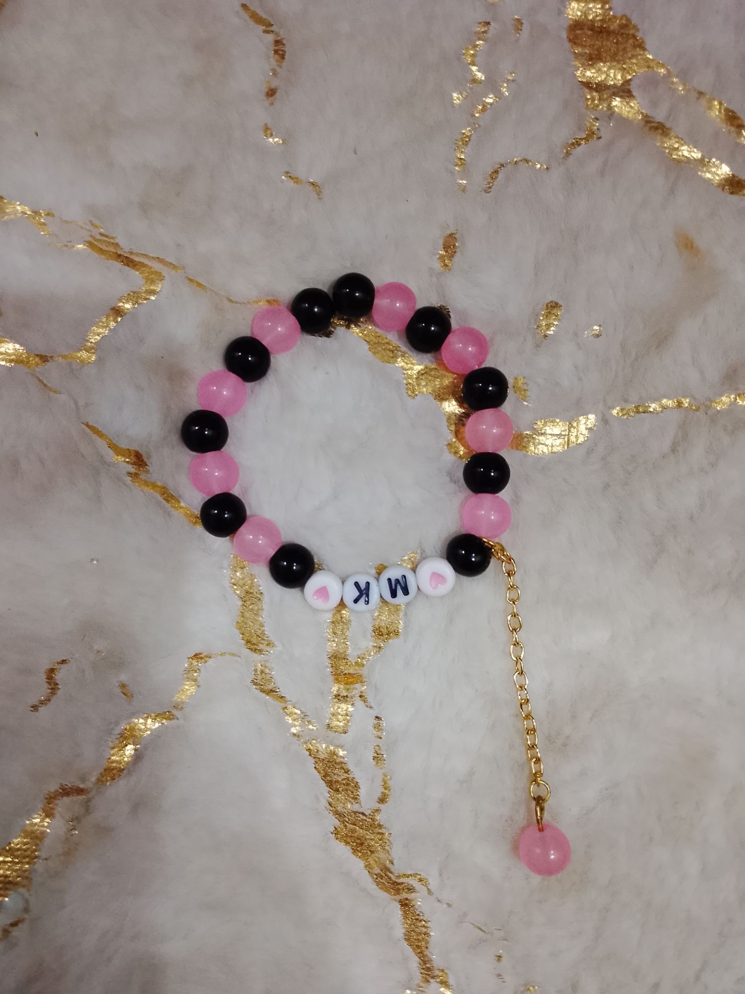 Beautiful Hand bracelet with Black/pink 🩷 marble beats, 2 heart beat ,  2 alphabet and attach chain