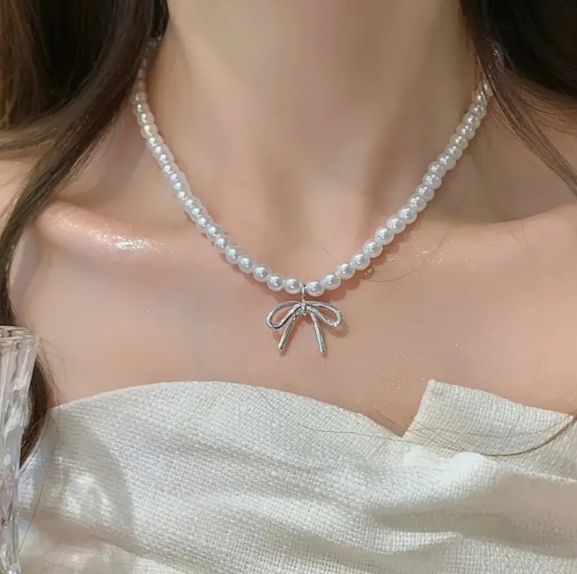 Elegant Pearl Bow Pendant Necklace
,Classic Pearl Chain with Bow Charm